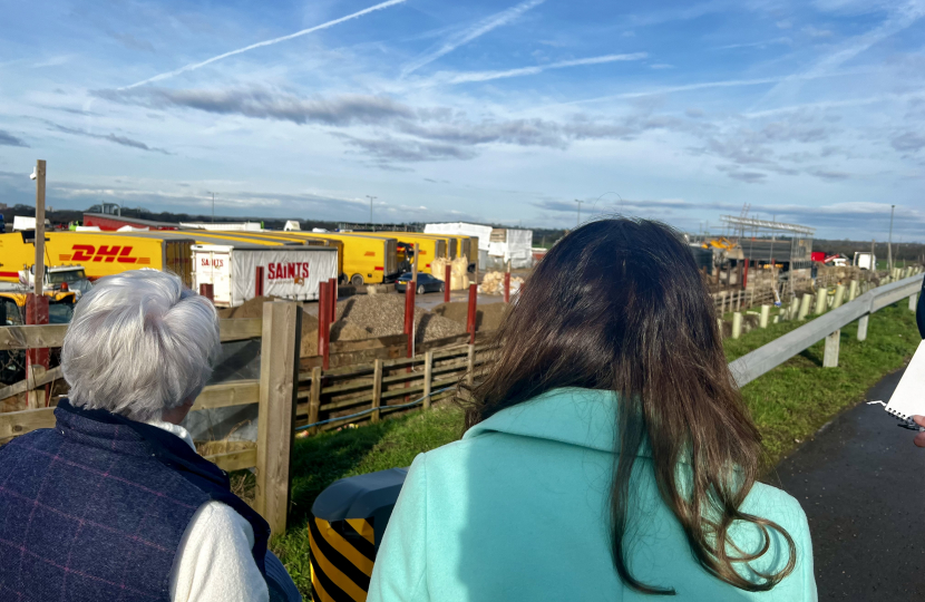 Joy and Dorney Parish Councillors looking at Orchard Herbs