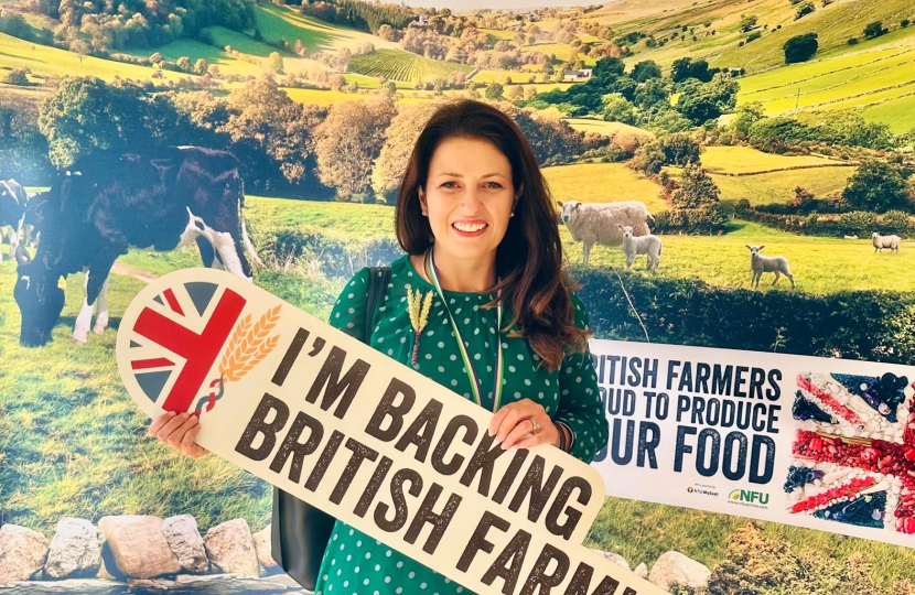 joy holding back British farming poster