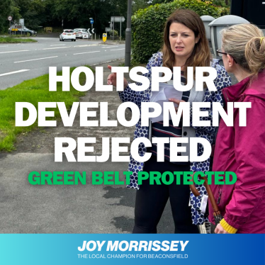 Holtspur Development Rejected Graphic with Joy and resident on site.