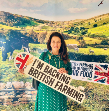 joy holding back British farming poster